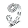 Versión coreana del anillo de amor tejido Dongdaemun ins más vendido, marea de Japón y Corea del Sur, personalidad transfronteriza con apertura de circonita, joyería al por mayor