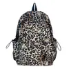 Mochila casual retrô com estampa de leopardo da moda, de grande capacidade, leve, para estudantes, bolsa de trabalho/escola, mochila nova de nicho