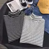 Camiseta de rayas para hombre primavera y otoño ropa interior popular suéter de cuello alto talla grande holgado versátil diario manga larga camisa básica negra y blanca