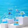 Adorno de escritorio popular de TikTok con temática oceánica e infusión de aceite para aliviar el estrés, regalo cultural y creativo, botella de arena líquida a la deriva al por mayor