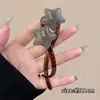 Grampo Elegante Estrela Torcida para Coque de Cabelo na Parte de Trás da Cabeça Presilha para Cabelo Feminina 2025 Novo Estilo de Luxo Presilha de Garra de Uma Linha Acessório de Cabelo
