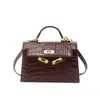 Bolso elegante y minimalista, nueva colección otoño 2026, moderno y chic, diseño único, bolso de hombro y bolso cruzado de moda, bolso cuadrado pequeño