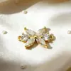Collar/Pulsera de Mariposa con Incrustaciones de Circonita Dorada Recubierta de Cobre de 18K con Doble Colgante/Conexión Accesorios de Joyería DIY de Perla Fabricante Mayorista