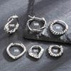 Personalidad Europea y Americana Acero de Titanio Vintage Distressed Aretes Retorcidos Pasador de Oreja Delgado Anillo de Oreja Aretes para Hombres y Mujeres