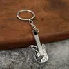 Chaveiro de guitarra Instrumentos musicais criativos Violino Piano Microfone Marca Estilo Pingente Atividades Pequenos Presentes Atacado