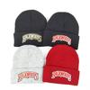 Venta directa de fábrica comercio exterior gorro de punto con pestaña acrílica gorro de punto con placa de luz