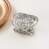 Anillo ovalado de acero inoxidable con diseño de círculo mágico hueco, moda personalizada transfronteriza europea y americana, con apertura ajustable y hebilla para bufanda