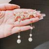 Pendientes de plata s925 con forma de aguja y lazo largo para mujer, elegantes pendientes de Corea del Sur, pendientes retro con borlas de perlas.