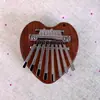 Kalimba de 8 tonos transfronteriza Piano de pulgar Pequeño de 8 teclas Mini instrumento musical Piano de pulgar Portátil de madera Transparente Piano de pulgar