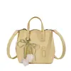 Bolso Cubo de Moda Retro con Patrón de Lichi Diseño de Nicho para Mujer Nuevo Modelo 2026 Bolso de Hombro de Alta Gama para Viajes