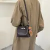 Bolso tipo cubo de alta gama para mujer 2026 nuevo estilo ins nicho bandolera bolso de mano de lujo ligero para el día a día colgante lindo