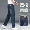 Calça jeans masculina reta solta transfronteiriça, calça business casual, simples e versátil, calça de trabalho resistente para primavera e outono para homens