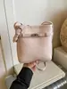 Bolsa Feminina Retro com Padrão Lichia Transfronteiriça 2026 Nova Versátil Texturizada Moda Commuter Ombro Transversal Celular Bolsa Balde