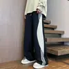 Pantalones retro americanos para hombre, pantalones de retazos a rayas de moda para primavera y otoño, pantalones deportivos casuales holgados de alta costura, a la moda