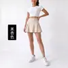 Falda corta plisada de movimiento transfronteriza de dos piezas falsas falda de tenis profesional para correr fitness yoga bádminton Pilates