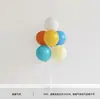 Soporte de columna flotante de mesa de globos retro de colores decoración de escena de fiesta de cumpleaños infantil arreglo accesorios para fotos venta al por mayor