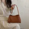 Bolso de mano nicho estilo minimalista coreano para mujer, nuevo de verano 2026, versátil retro para uso diario, bolso casual de hombro y axila