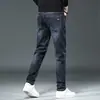 Jeans de Sarja Masculino para Atacado Primavera e Outono Marca da Moda Calças Casuais Retas Largas Moda Calças Masculinas Lavadas em Água Elásticas Versáteis Calças Compridas