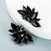 Personalidad europea y americana flor geométrica aleación diamante aretes de diamantes aretes simples retro para mujer aretes al por mayor