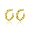 Brincos de design de corda torcida estilo europeu para mulheres, luxo leve, sensação de alta qualidade, dourado, prateado, moderno, joia de orelha versátil, best-seller transfronteiriço