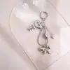 Pingente de Bolsa Laço de Acrílico Prata Corrente de Cobra Chaveiro de Carro Metalizado Corrente Criativa para Celular Venda por Atacado
