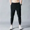 Pantalones casuales versátiles para hombre, pantalones jogger de corte holgado, pantalones jogger de moda para hombre 2025, pantalones versátiles de moda estilo Hong Kong para hombre