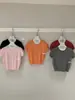 Wgwe9428 Ropa de Mujer Shisanxing Guangzhou Verano 2026 Nuevo Cuello Redondo Hombro Normal Versátil Manga Corta Top de Punto