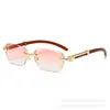 Nuevas Gafas de Sol de Moda Europeas y Americanas de Gama Alta Patas con Textura de Madera para Exteriores Gafas sin Montura con Bordes Cortados Anti-UV Gafas de Sol para Mujer