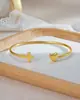 Pulsera Cruz Venta Caliente Acero Inoxidable Nicho Moda Simple Cruz Corazón Abierta Ajustable Regalo para Mujer