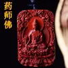 Escultura de sândalo vermelho lobular Mestre da Medicina Buda cartão nada peça de mão carro seguro marca cartão de Buda pingente placa portátil pingente de brincar