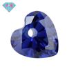 Huagang gema agujero único medio en forma de corazón circón azul Tan sang piedra desnuda al por mayor gema sintética artificial Tan Sang Lan