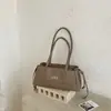 Bolso de mujer con patrón de rombos, nuevo modelo de otoño 2026, bolso de nicho de lujo ligero de alta gama para el día a día, bolso de hombro y axila de gran capacidad