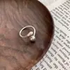 Anillo de gota de agua de plata de ley s925 Fangxing diseño de nicho femenino sentido de la personalidad simple moda anillo abierto de bola anillo de comida