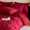 Juego de cuatro piezas de jacquard de doble capa de gasa teñido en hilo de algodón de alta gama para boda en rojo, sábana y funda de edredón de algodón puro, ropa de cama para boda