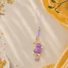 Encantador y lindo amuleto de bolso de conejo corriendo en brocado Song, llavero de recuerdo cultural y creativo DIY, accesorio colgante para correa de teléfono estilo chino