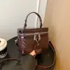 Bolso de mano de alta gama transfronterizo, modelo nuevo 2026, gran capacidad, casual, moderno, versátil, adecuado para ir al trabajo, bolso cuadrado pequeño de hombro y cruzado