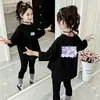 Blusas de algodón puro para niñas, nuevo estilo otoño 2026, camiseta interior básica para niñas, camiseta de manga larga para niñas mayores, primavera y otoño