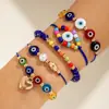 Estilo Bohemio Transfronterizo Europeo y Americano Ojos de Cuentas de Arroz Coloridas Juego de Diez Piezas Pulsera de Cuentas Exagerada Dopamina Venta al por Mayor para Mujeres