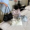 Bolso tipo tote de cuero suave con cordón estilo coreano para mujer, verano 2026, gran capacidad, simple y elegante, sensación de alta gama, bolso de hombro y cruzado