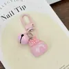 Chaveiro Sino de Sobremesa Sakura Fofo Estilo Ins Feminino Doce Pingente de Flor Acessórios para Mochila de Estudante