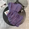 Conjunto deportivo estilo Chanel para mujer 2026, nueva versión coreana de moda, diseño adelgazante y rejuvenecedor, conjunto de dos piezas de pantalones cortos de manga corta
