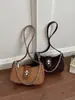 Bolsa de ombro com alça de trava, design de nicho, bolsa transversal para o dia a dia, versátil, estilosa, simples, bolsa de mão moderna