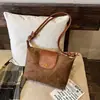 Bolso de hombro de alta gama Dongdaemun coreano transfronterizo, bolso de mano moderno retro minimalista, bolso de axila con textura de gamuza