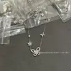 Collar de Mujer Redondo Atrapasueños Versión Alta V Jardín Dorado Mariposa Gota de Agua Diamante Borla Diamante de Alto Carbono Circonio Estilo de Alta Gama
