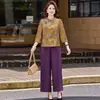 Conjunto estiloso de duas peças novo estilo chinês para mulheres de meia-idade e idosas, roupa para mães, conjunto de jacquard estilo nacional com calça pantalona para mulheres