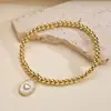 Aogu Nova Moda Versátil Transfronteiriça Cobre Banhado a Ouro 18K Pingente Geométrico de Coração com Gotejamento de Óleo Pulseira com Contas para Mulheres