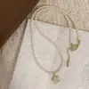 Colar de Pérolas Camélia Estilo Francês para Mulheres, Pequena Corrente Clavicular Inspirada em Chanel de Luxo Leve, Design de Nicho, Acessório com Senso de Elegância