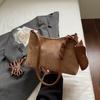 Bolsa Tote Tecida de Couro Macio Retrô para Mulheres Verão 2025 Nova Bolsa de Grande Capacidade de Alto Valor Bolsa para Comuteiro de Ombro Axila