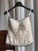 Camisole de renda retrô estilo francês com sutiã embutido, corte justo, que valoriza a silhueta e adequada como camada interna ou um top básico
