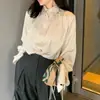 Ropa de mujer de Dongdaemun, Corea del Sur, camisa elegante de alta calidad estilo francés con mangas acampanadas y caída